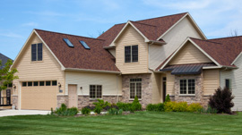 Beige house with attached garage