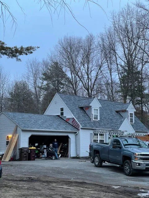 A home with a new grey shingle roof